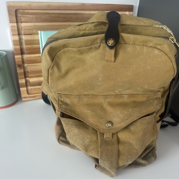 Filson Tan Canvas Backpack Rugged and Vintage-Inspired